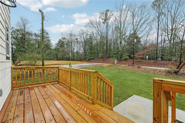wooden deck with a yard