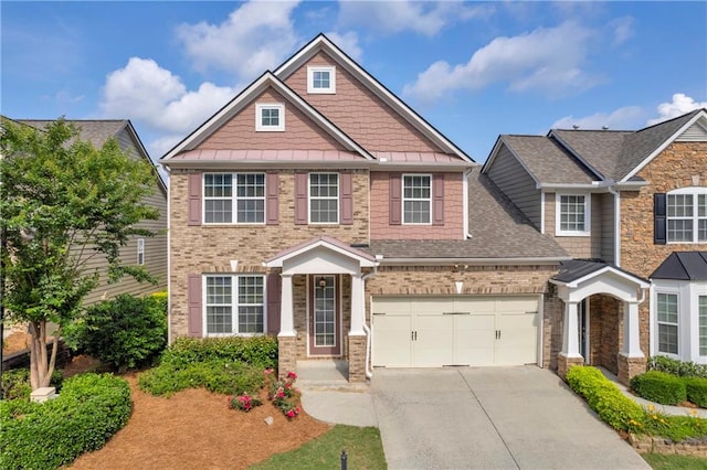 2677 Sardis Chase Ct, Buford, GA 30519 - view of front of house with driveway, roof with shingles, brick siding, and a standing seam roof