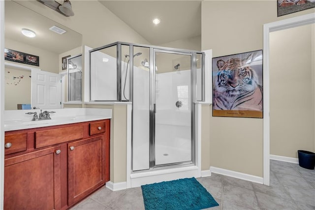 2677 Sardis Chase Ct, Buford, GA 30519 - full bathroom featuring a shower stall, vanity, vaulted ceiling, baseboards, and tile patterned floors