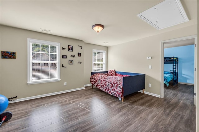 2677 Sardis Chase Ct, Buford, GA 30519 - bedroom with attic access, multiple windows, wood finished floors, and baseboards