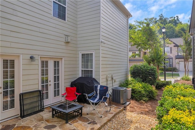 2677 Sardis Chase Ct, Buford, GA 30519 - view of patio / terrace with cooling unit, area for grilling, french doors, and a fire pit