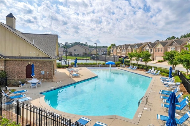 2677 Sardis Chase Ct, Buford, GA 30519 - community pool featuring a patio and a residential view