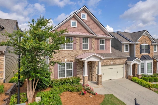 2677 Sardis Chase Ct, Buford, GA 30519 - craftsman house featuring concrete driveway, a standing seam roof, brick siding, and metal roof