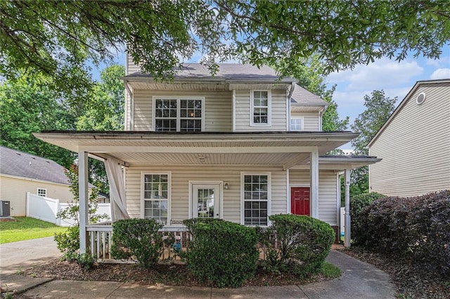 121 Ashgate Way, Carrollton, GA 30117 - view of front of property featuring a porch, central AC unit, and a chimney