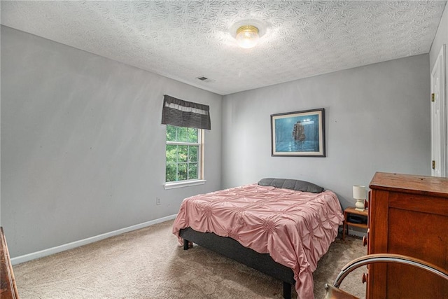 121 Ashgate Way, Carrollton, GA 30117 - carpeted bedroom with baseboards and a textured ceiling