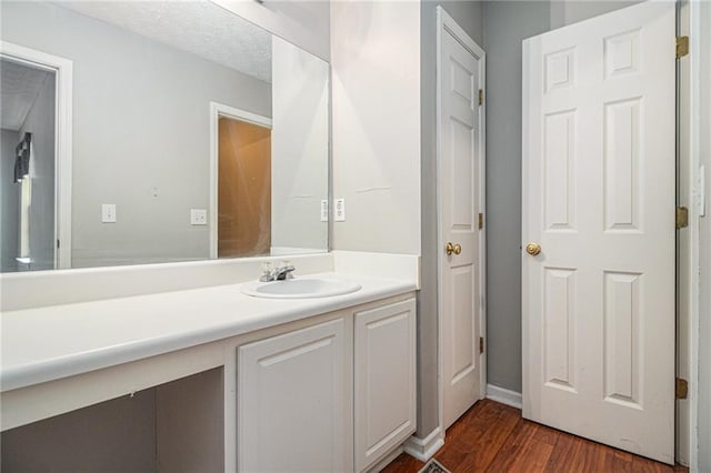 121 Ashgate Way, Carrollton, GA 30117 - bathroom featuring wood finished floors and vanity
