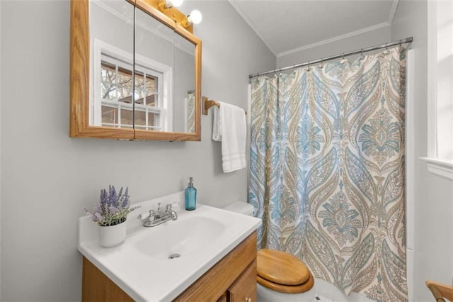 full bath featuring vanity, crown molding, curtained shower, and toilet