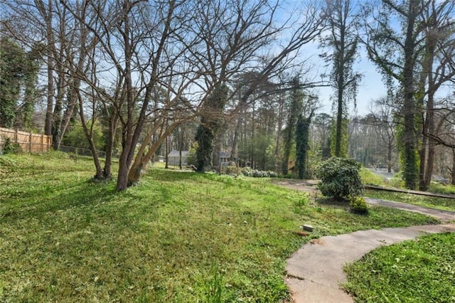 view of yard with fence