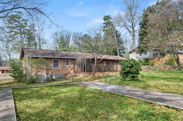 ranch-style house with crawl space, a front lawn, and fence