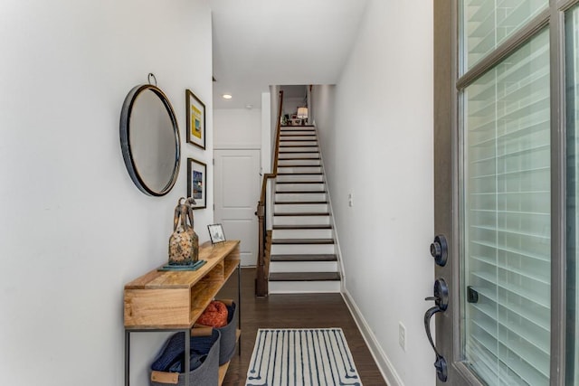 entrance foyer with dark hardwood / wood-style floors