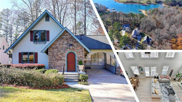 birds eye view of property with a water view