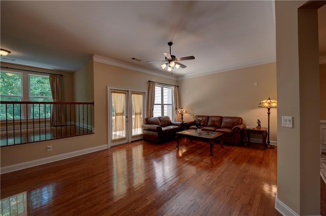 1622 Rivergreen Bnd SE Unit 26, Atlanta, GA 30339 - living area featuring wood finished floors, ceiling fan, healthy amount of natural light, and crown molding