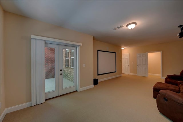 1622 Rivergreen Bnd SE Unit 26, Atlanta, GA 30339 - carpeted home theater room featuring french doors
