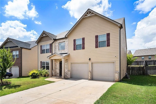 view of front of house with a garage and a front lawn