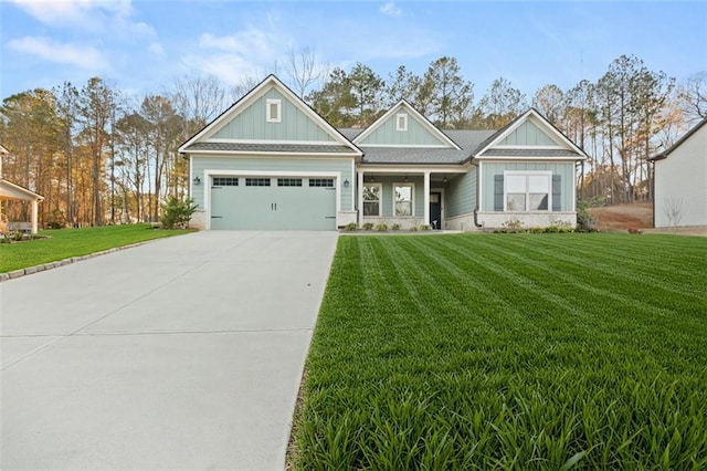 2316 Ridge View Dr, Loganville, GA 30052 - craftsman inspired home with a front yard, board and batten siding, driveway, and an attached garage