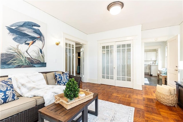 living room featuring parquet floors and french doors