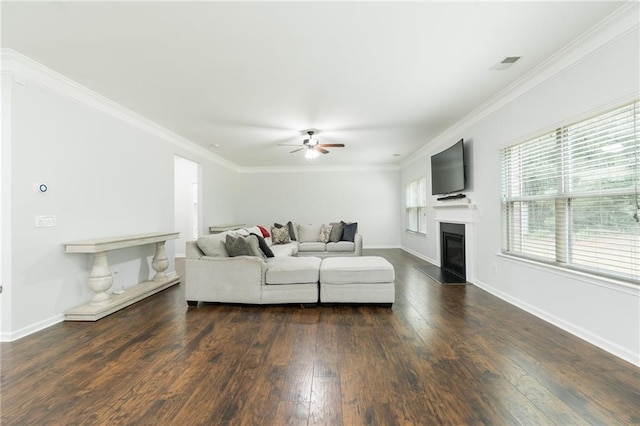 60 Copeland Trce, Dallas, GA 30157 - living room featuring ceiling fan, dark wood-style flooring, a glass covered fireplace, baseboards, and crown molding
