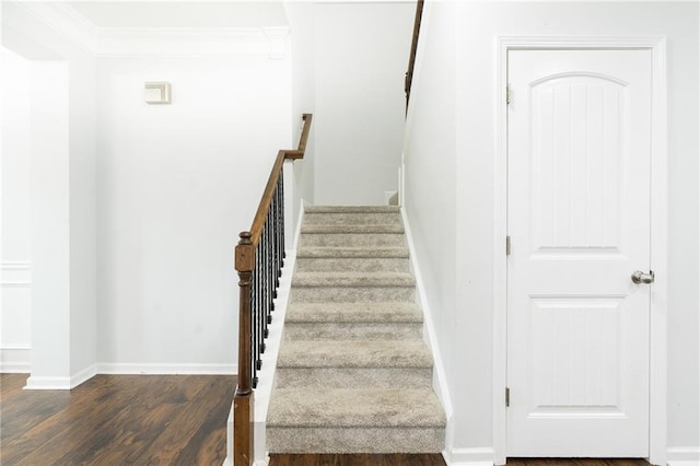 60 Copeland Trce, Dallas, GA 30157 - stairs with wood finished floors, crown molding, and baseboards