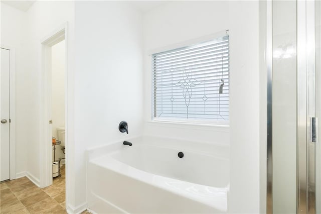 60 Copeland Trce, Dallas, GA 30157 - bathroom with a bath and toilet