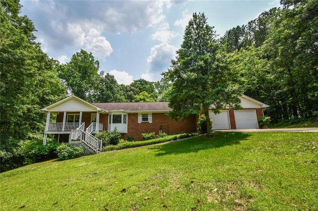 3223 Heritage Way, Buford, GA 30519 - single story home featuring a porch, brick siding, a front lawn, and stairs