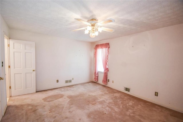 3223 Heritage Way, Buford, GA 30519 - spare room with carpet floors, a ceiling fan, baseboards, and a textured ceiling