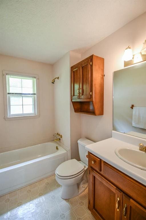 3223 Heritage Way, Buford, GA 30519 - bathroom featuring toilet, vanity, shower / bathtub combination, and tile patterned floors