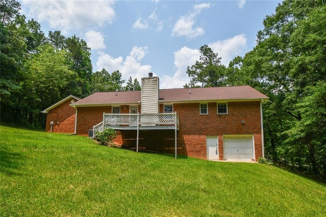 3223 Heritage Way, Buford, GA 30519 - rear view of property with brick siding, a garage, a chimney, a lawn, and driveway