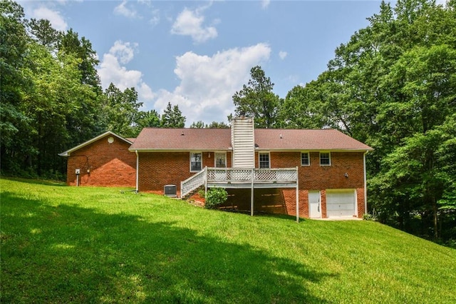 3223 Heritage Way, Buford, GA 30519 - rear view of house featuring brick siding, stairs, a garage, and a yard