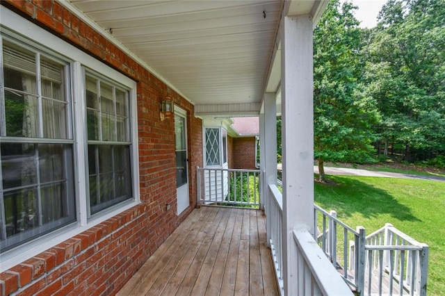 3223 Heritage Way, Buford, GA 30519 - wooden porch featuring a yard