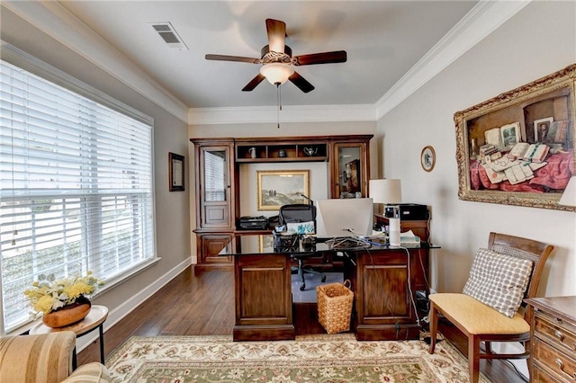 office area with crown molding, visible vents, ceiling fan, wood finished floors, and baseboards