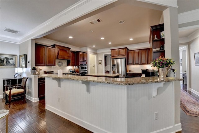 kitchen with visible vents, light stone counters, appliances with stainless steel finishes, dark wood-type flooring, and open shelves