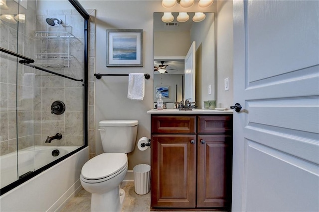 full bathroom featuring enclosed tub / shower combo, toilet, vanity, baseboards, and visible vents