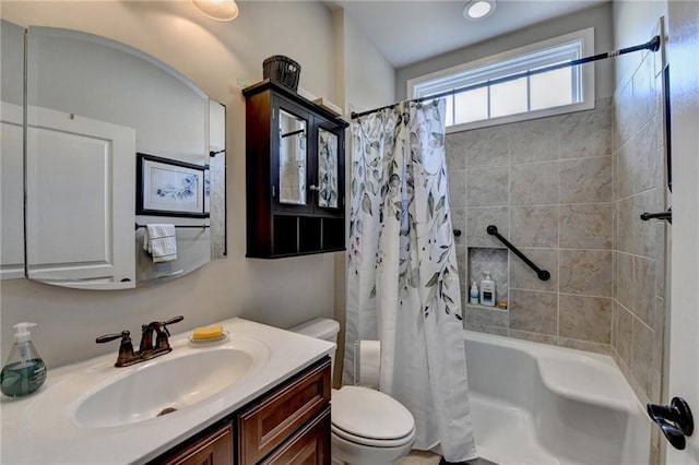 bathroom with vanity, toilet, and shower / bathtub combination with curtain