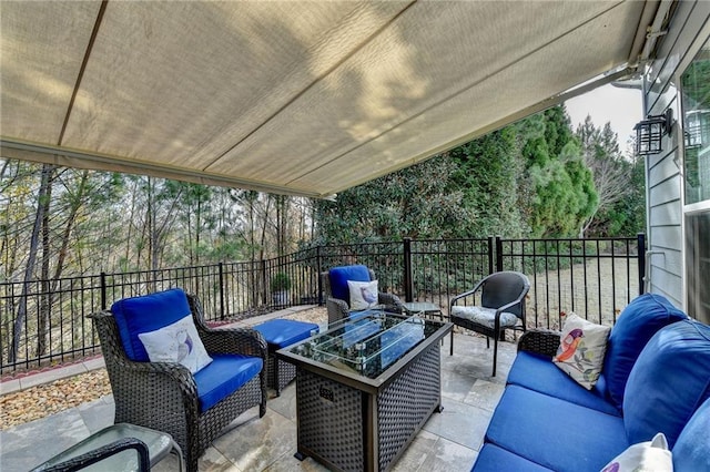 view of patio with fence and an outdoor hangout area