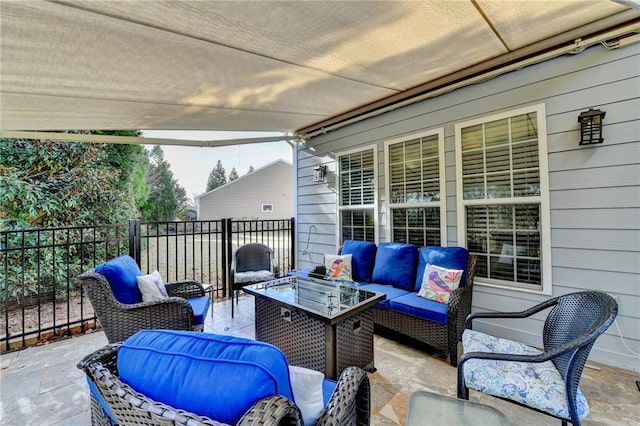 view of patio with fence and an outdoor living space