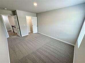 unfurnished bedroom featuring carpet floors