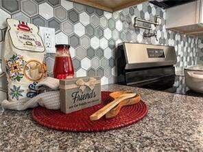 kitchen featuring stainless steel electric range oven