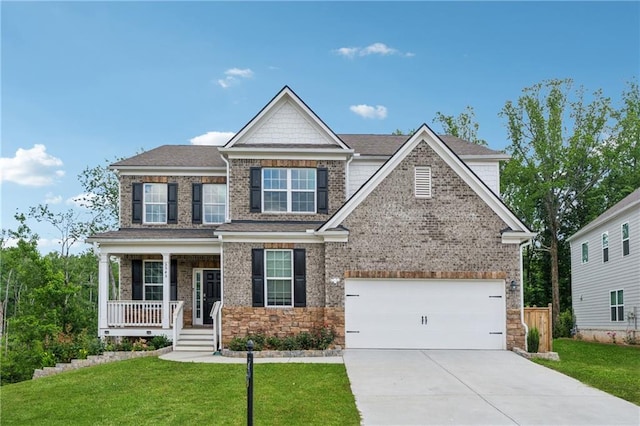 5545 Adirondack Dr, Cumming, GA 30040 - craftsman-style house with driveway, covered porch, a front lawn, and a garage