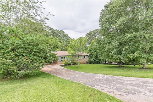 view of front of home with a front lawn