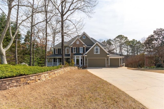 view of front of home with driveway and an attached garage