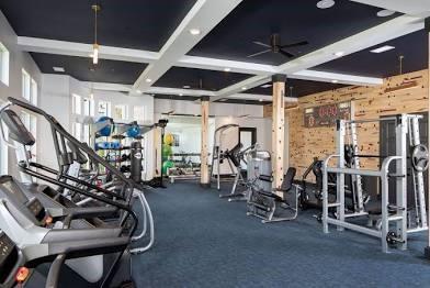 4037 Hill Station Ct, Sugar Hill, GA 30518 - workout area with ceiling fan and beamed ceiling