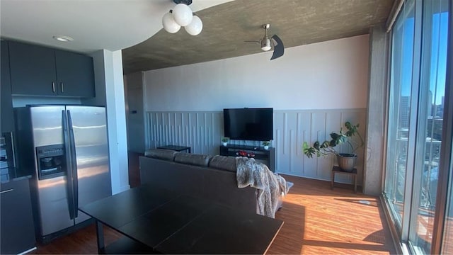 361 17th St NW Unit 1717, Atlanta, GA 30363 - living area featuring dark wood-style flooring and a wainscoted wall