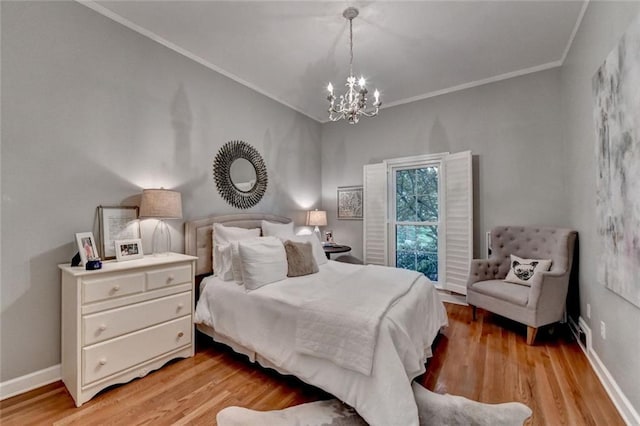 5475 Trowbridge Dr, Dunwoody, GA 30338 - bedroom with crown molding, light wood finished floors, an inviting chandelier, and baseboards