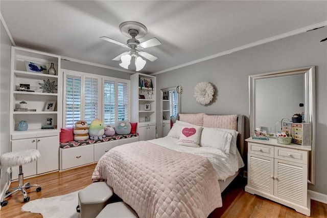 5475 Trowbridge Dr, Dunwoody, GA 30338 - bedroom with crown molding, light wood finished floors, and a ceiling fan