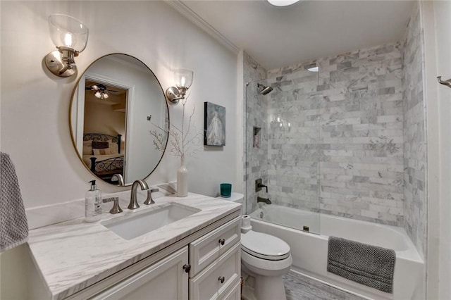 5475 Trowbridge Dr, Dunwoody, GA 30338 - full bathroom featuring shower / bathtub combination, toilet, vanity, a ceiling fan, and ensuite bath