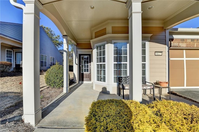 property entrance with covered porch