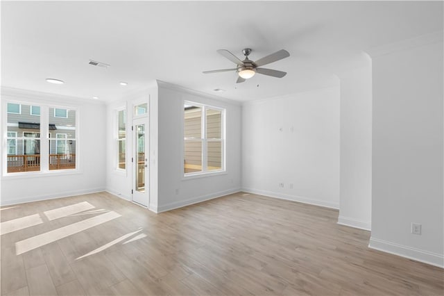 3167 Moor View Rd Unit 35, Duluth, GA 30096 - spare room with crown molding, a ceiling fan, visible vents, and light wood-style floors