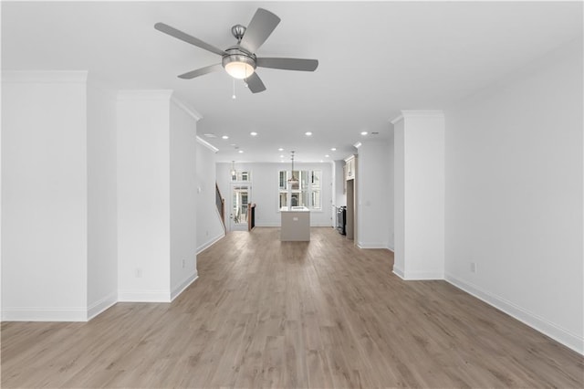 3167 Moor View Rd Unit 35, Duluth, GA 30096 - unfurnished living room with crown molding, recessed lighting, baseboards, and light wood finished floors