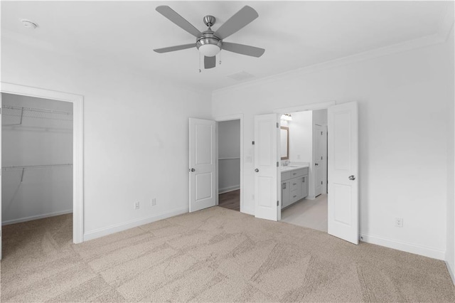 3167 Moor View Rd Unit 35, Duluth, GA 30096 - unfurnished bedroom featuring light colored carpet, ornamental molding, baseboards, and a walk in closet