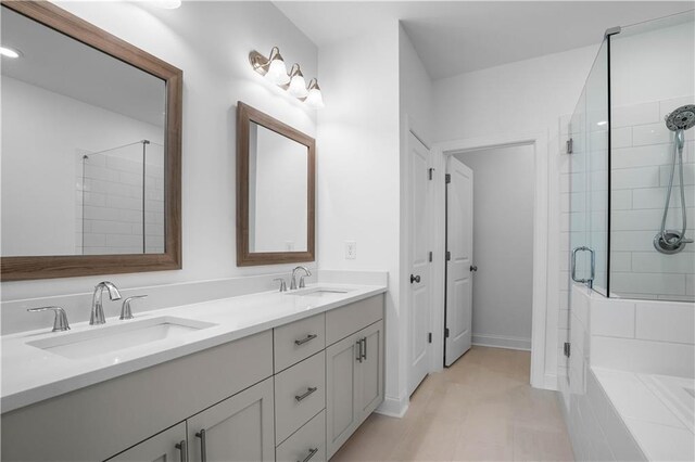3167 Moor View Rd Unit 35, Duluth, GA 30096 - full bath featuring double vanity, baseboards, a sink, and a stall shower
